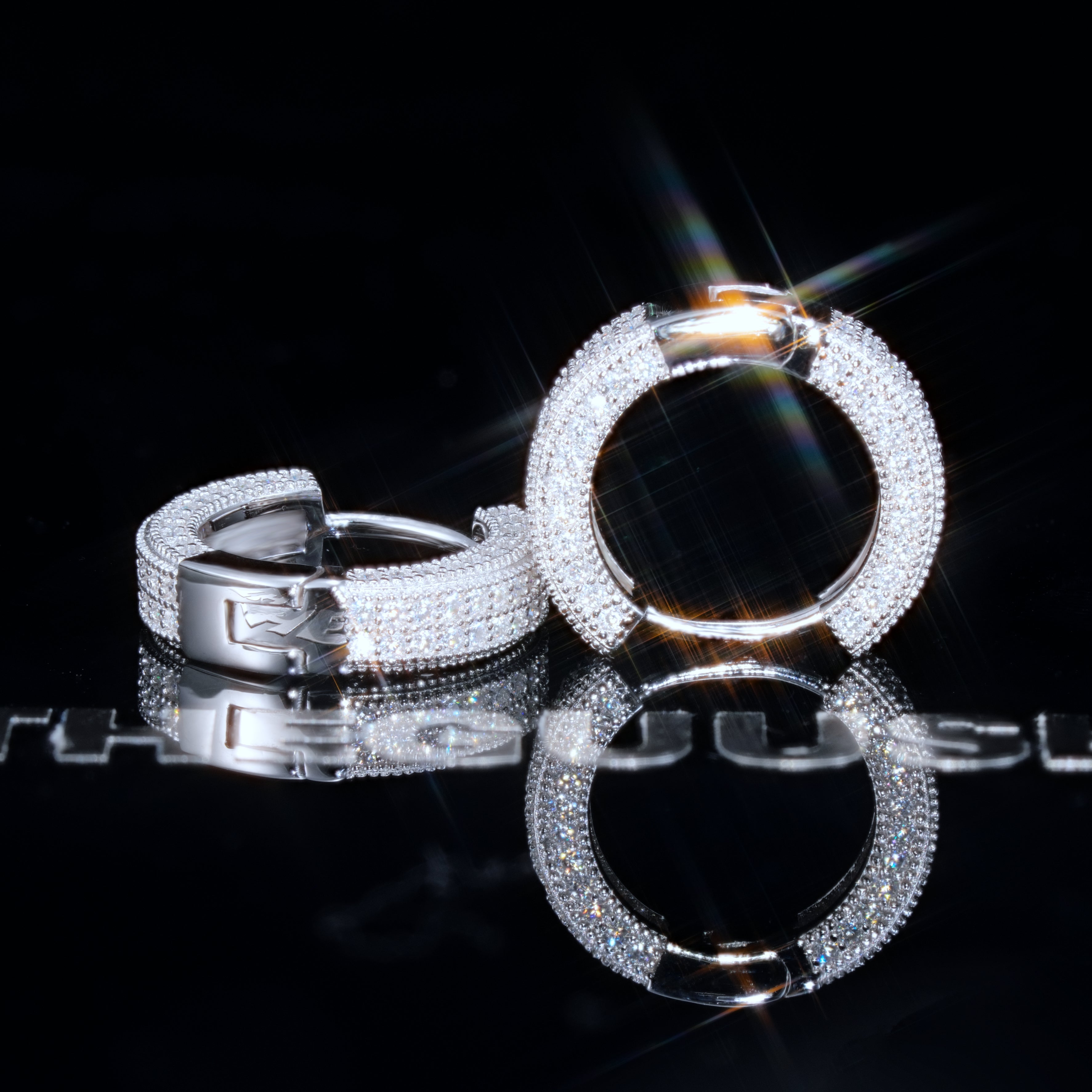 925s VVS1 Moissanite Fully Iced 3D Hoop Earrings In White Gold
